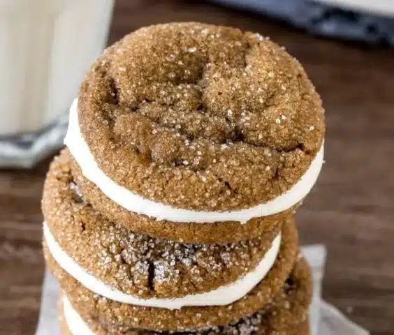 Ginger Molasses Cookies with cream filling on a plate