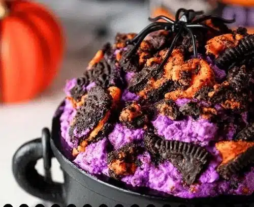 Halloween Cheesecake Fluff dessert in a festive bowl