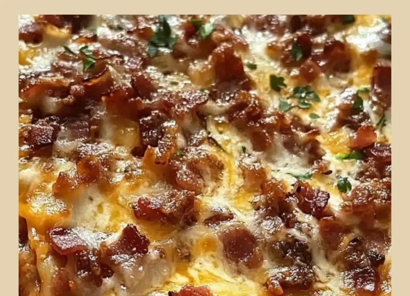 Delicious Parmesan garlic bacon cheeseburger lasagna served in a baking dish